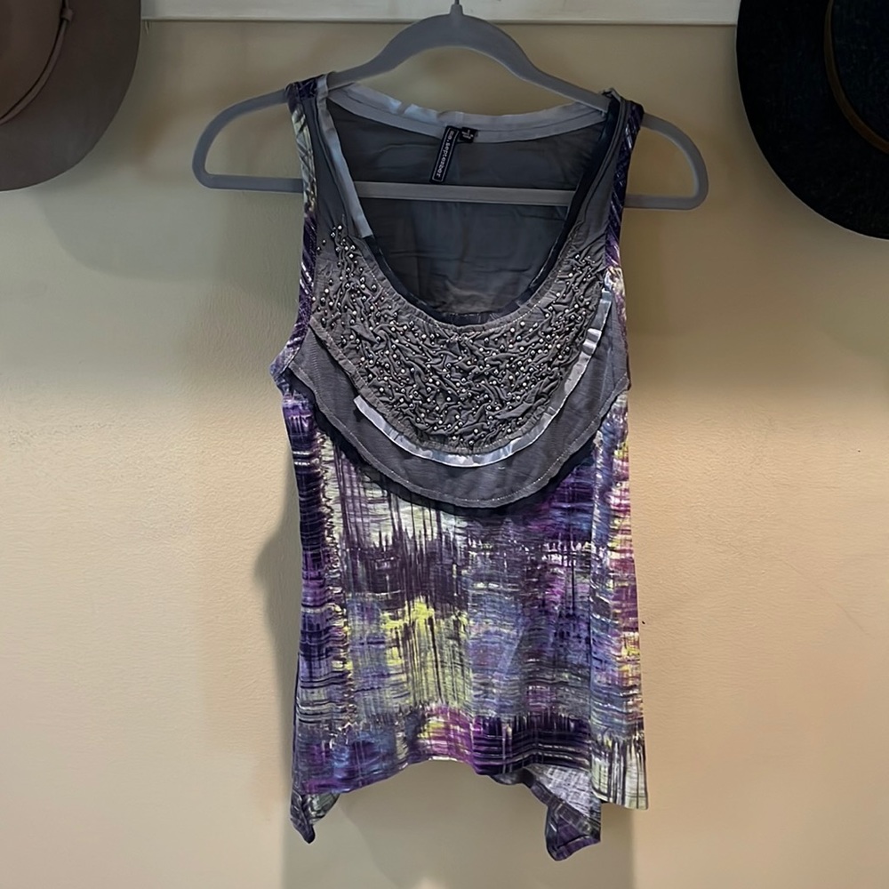 Abstract, beaded tank